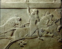 Ашшурбанипал охотится на льва (барельеф из Ниневии)
